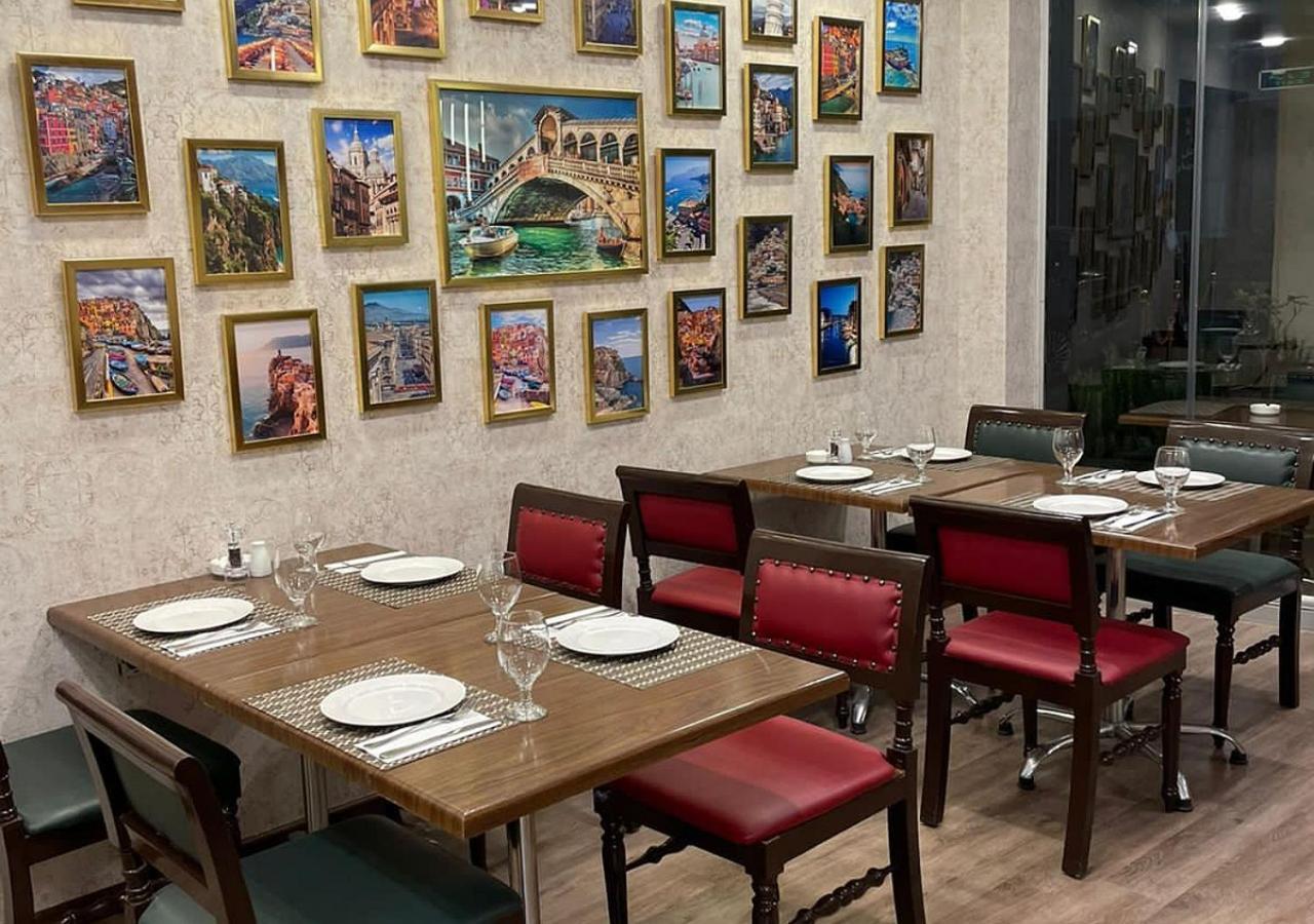 Torino Hotel Аман Екстериор снимка