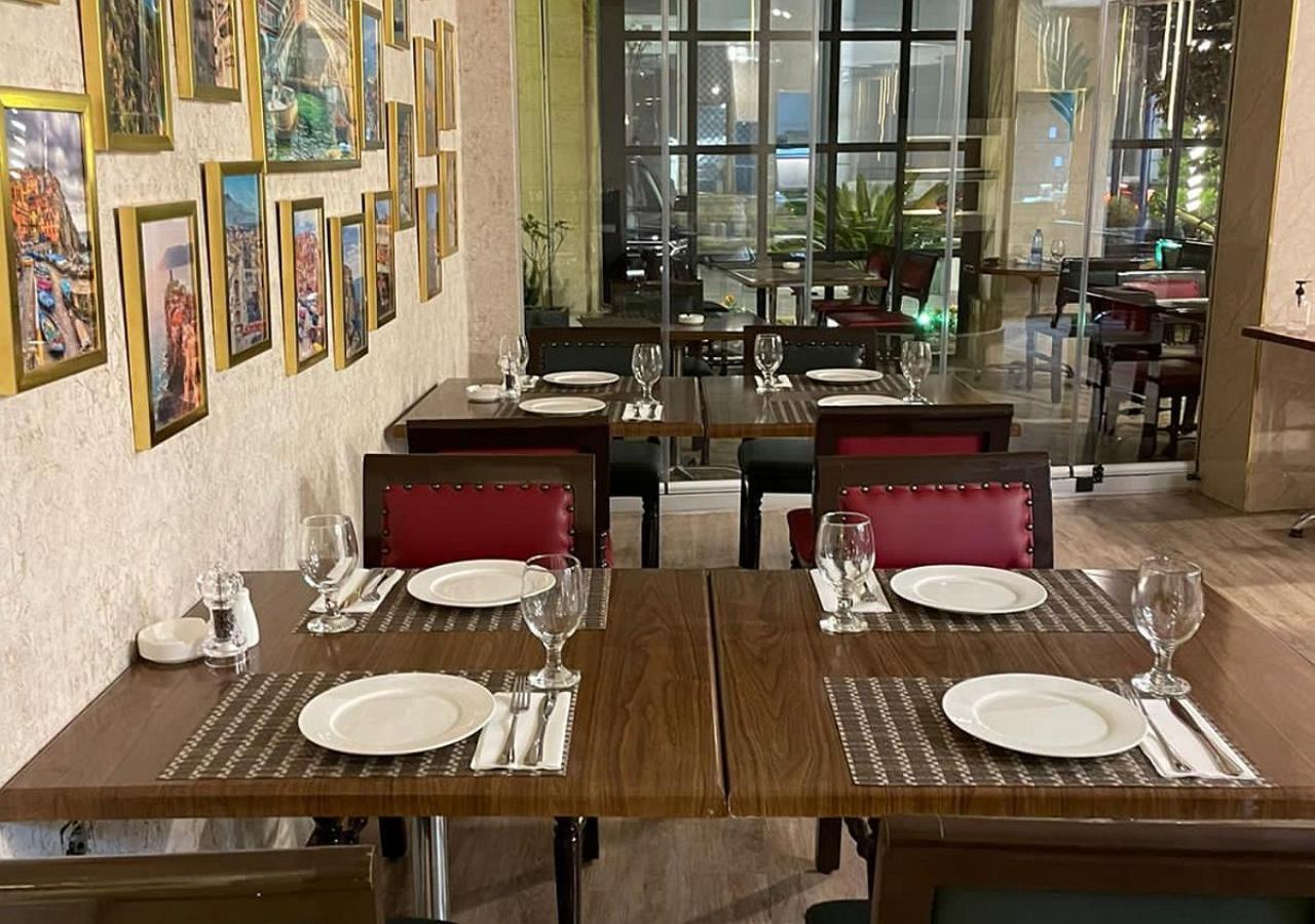 Torino Hotel Аман Екстериор снимка