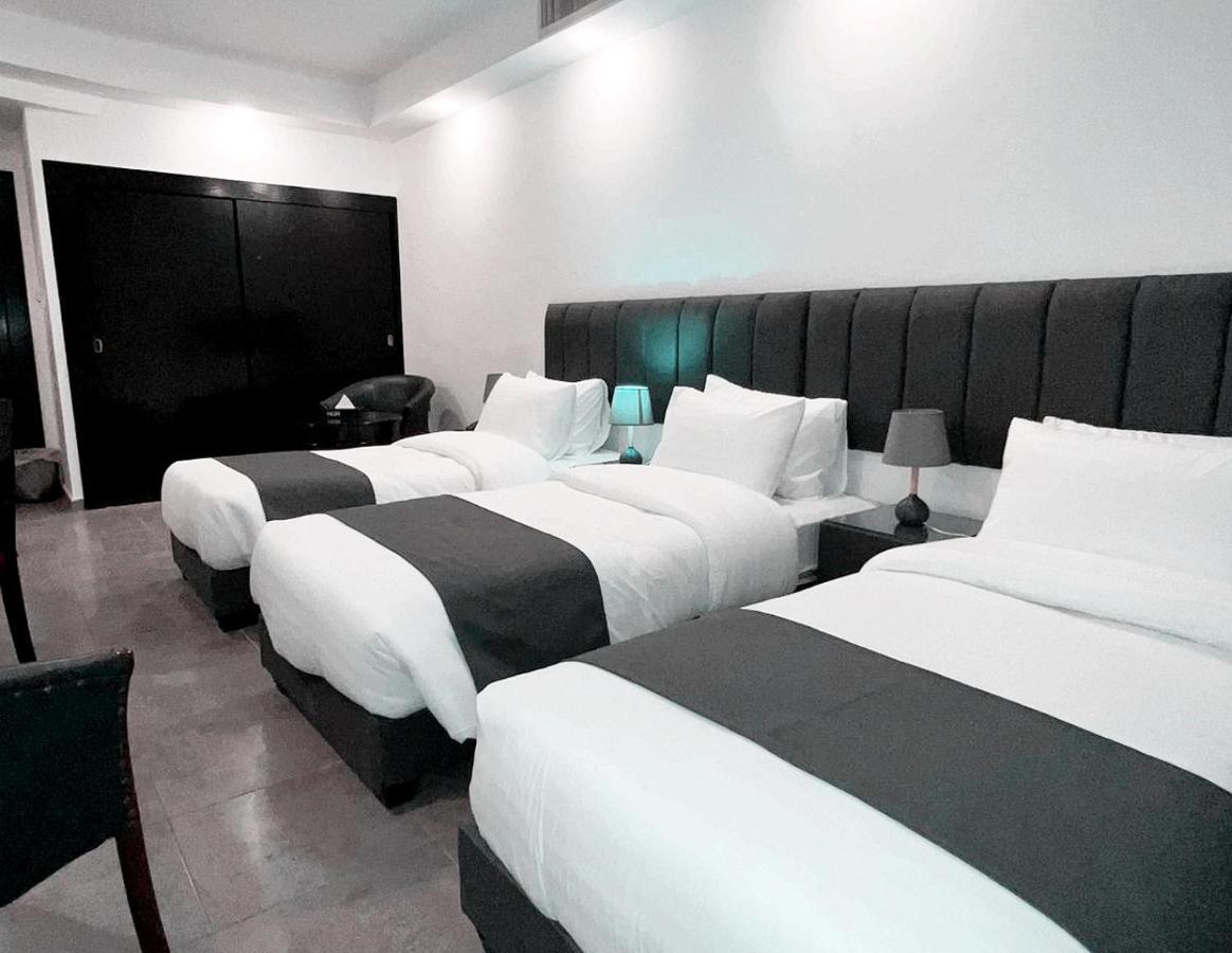 Torino Hotel Аман Екстериор снимка