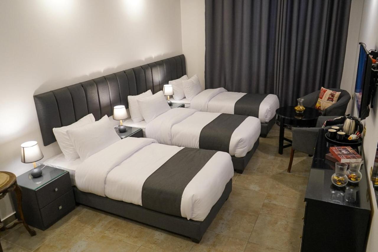 Torino Hotel Аман Екстериор снимка