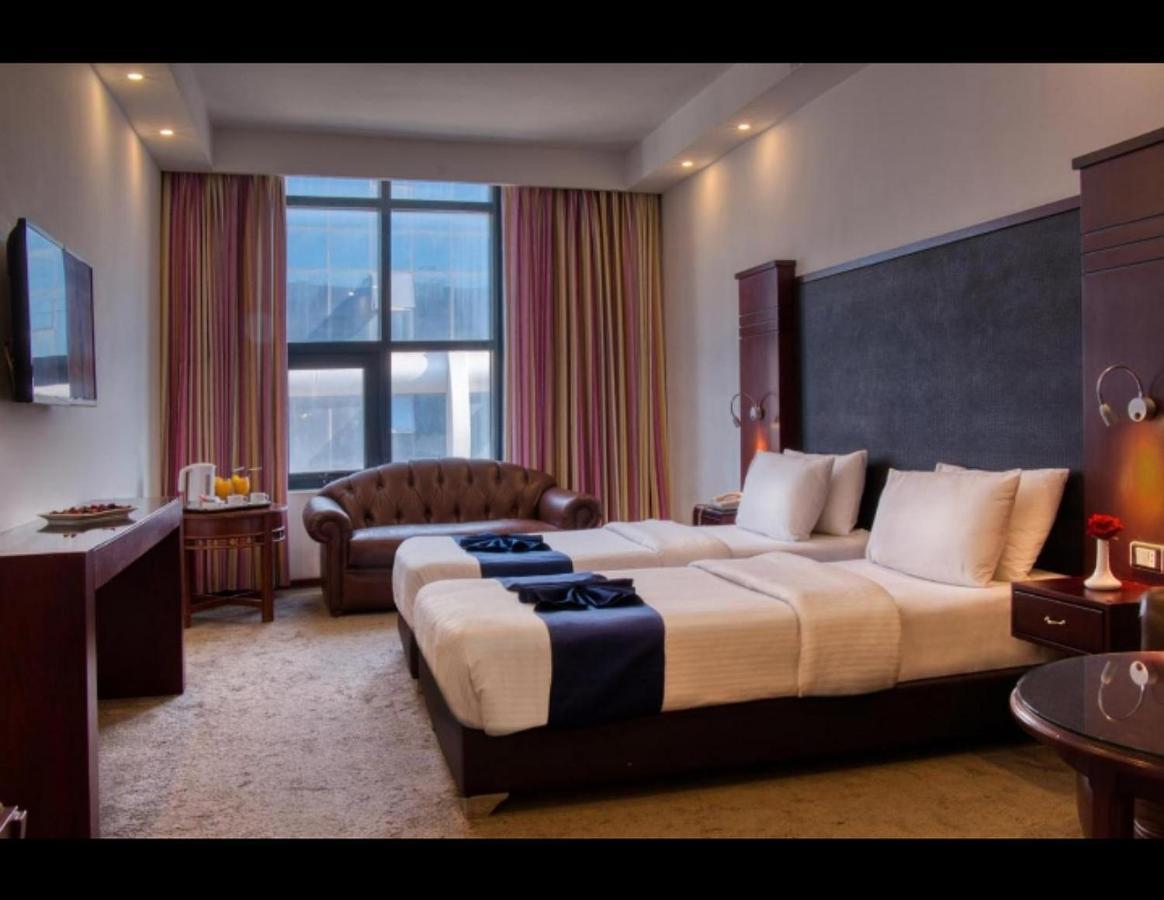 Torino Hotel Аман Екстериор снимка