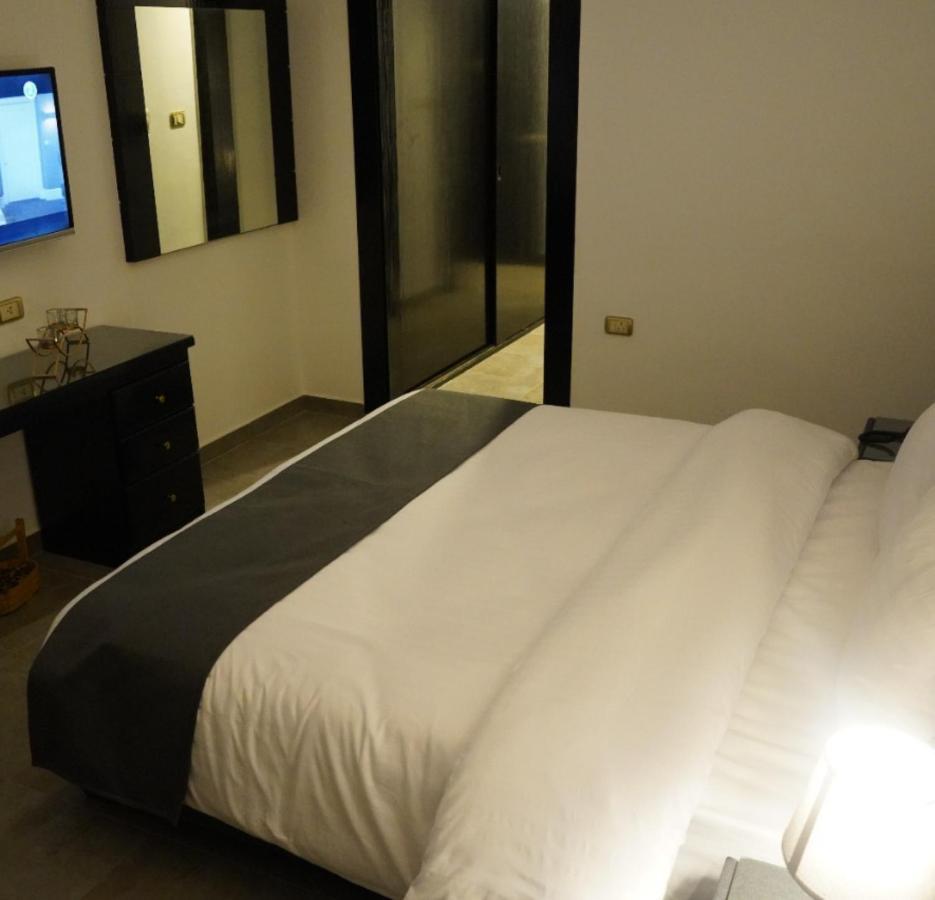 Torino Hotel Аман Екстериор снимка