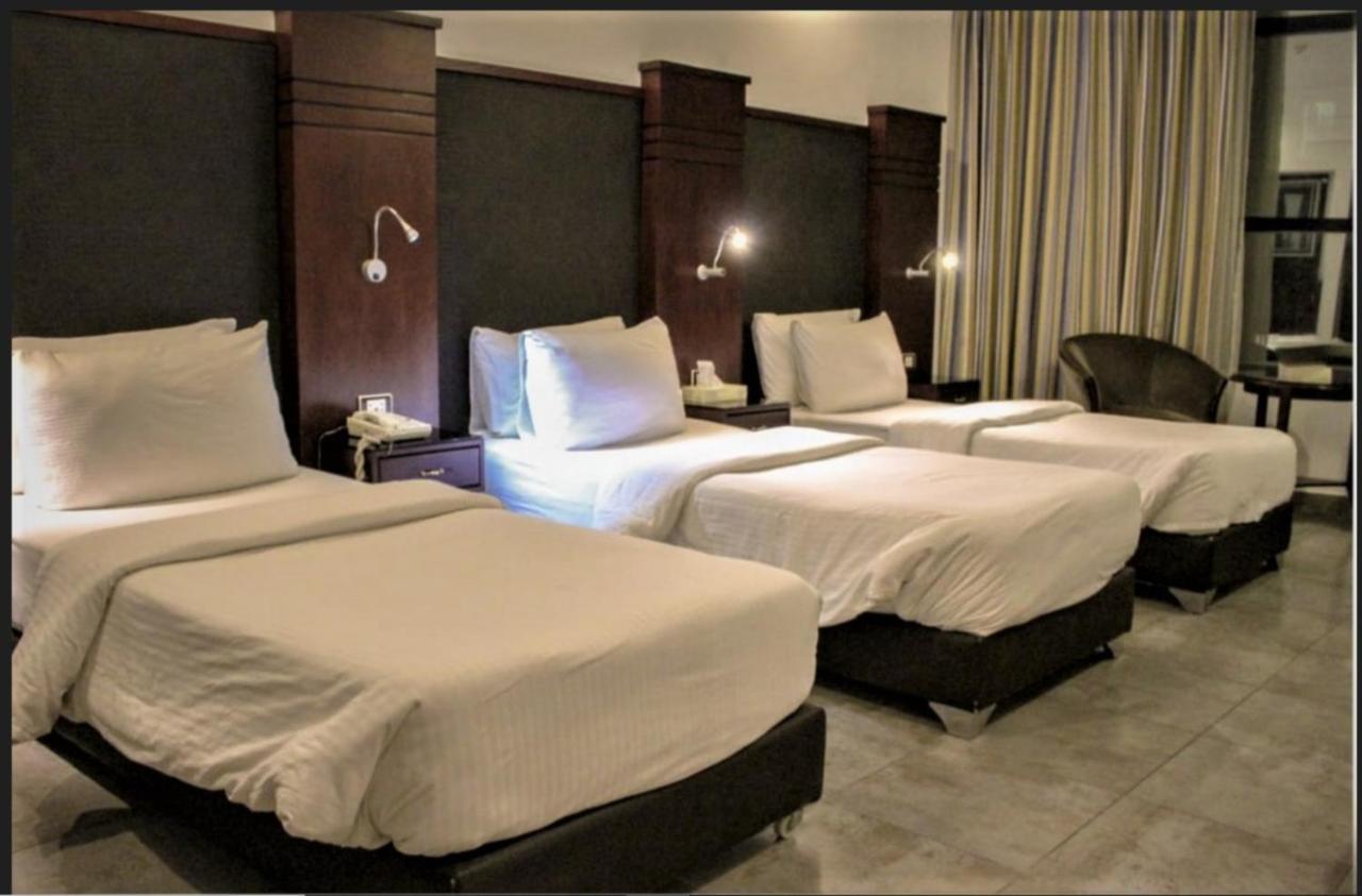 Torino Hotel Аман Екстериор снимка