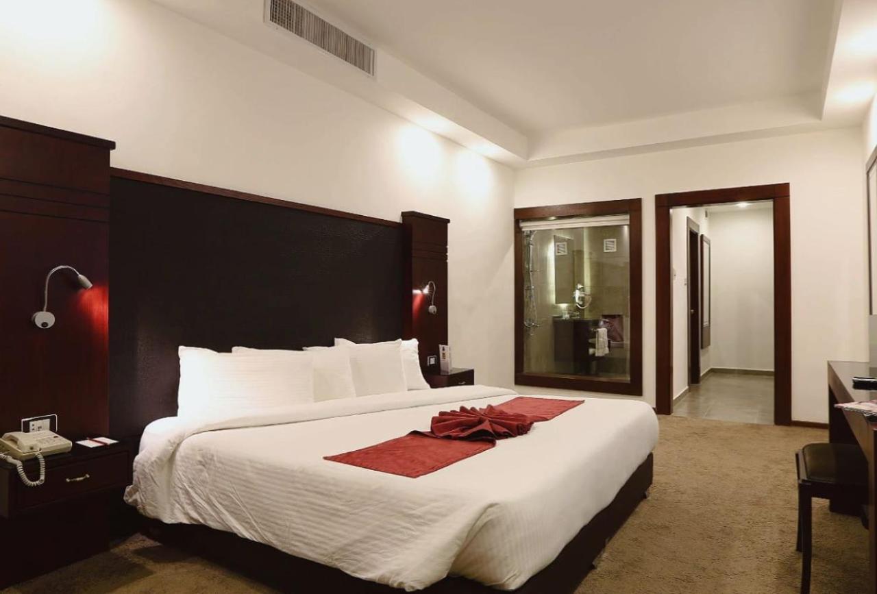 Torino Hotel Аман Екстериор снимка