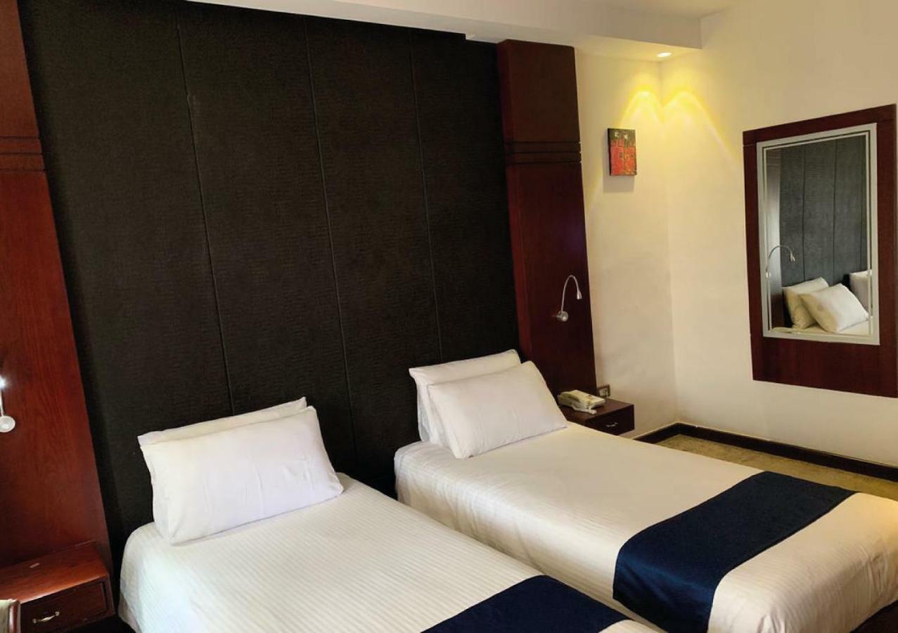 Torino Hotel Аман Екстериор снимка
